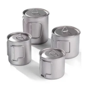 Four TA1 titanium folding handle mugs with matching lids shown in different sizes on a white background.