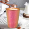 Gradient TiRoam titanium cup filled with latte coffee, colorful pure titanium drinkware for daily use