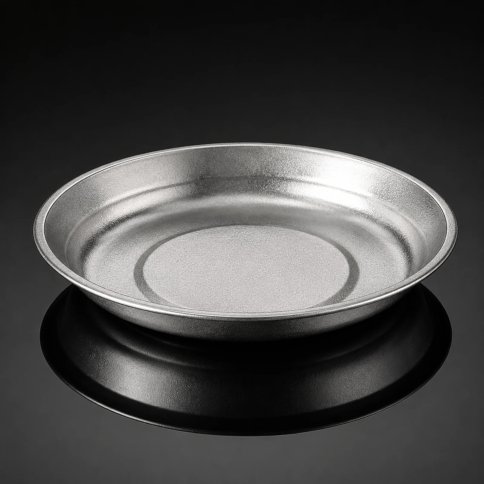 TiRoam pure titanium plate on a dark reflective background, lightweight metal dinner plate for camping, backpacking, outdoor dining, and everyday meals.