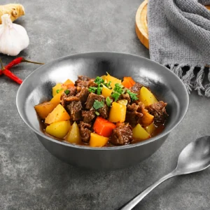 TiRoam titanium bowl served with beef stew and potatoes, reusable pure titanium bowl for hot meals, kitchen dining, camping, and outdoor cooking.