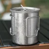 Back view of pure titanium camp mug with folding handles