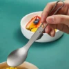 Pure titanium folding spoon in use